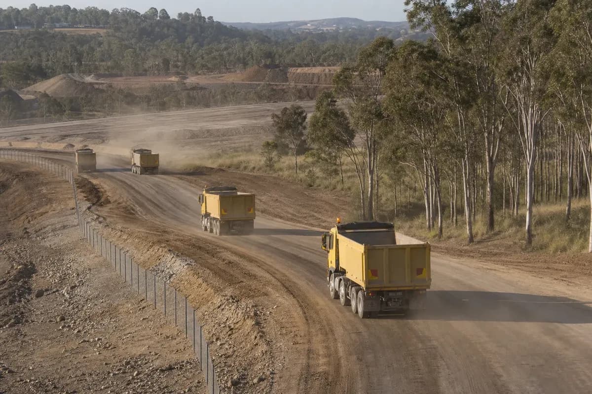 Haul road construction NSW tipper corridor linking stockpile area to site gate across NSW industrial hinterland