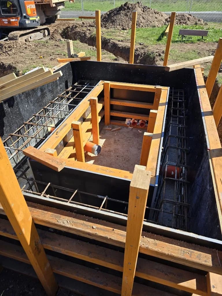 Reinforced formwork prepared for a battery storage civil foundation on an Australian industrial energy site.
