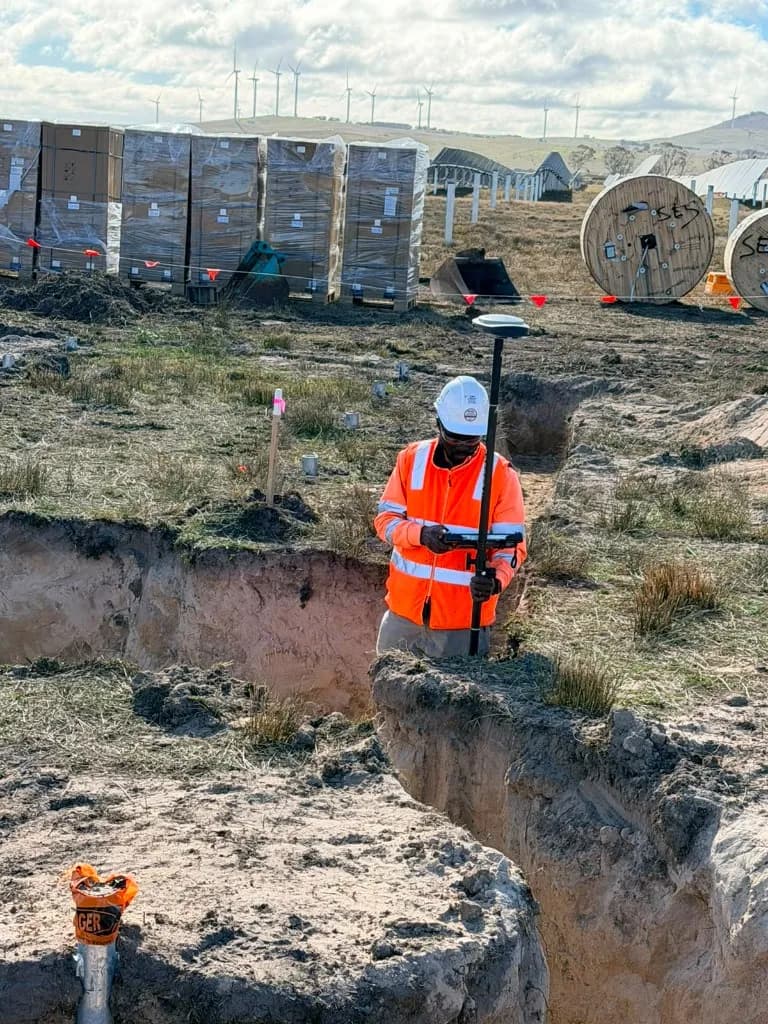 Survey control in a cable trench at Blind Creek Solar Farm.